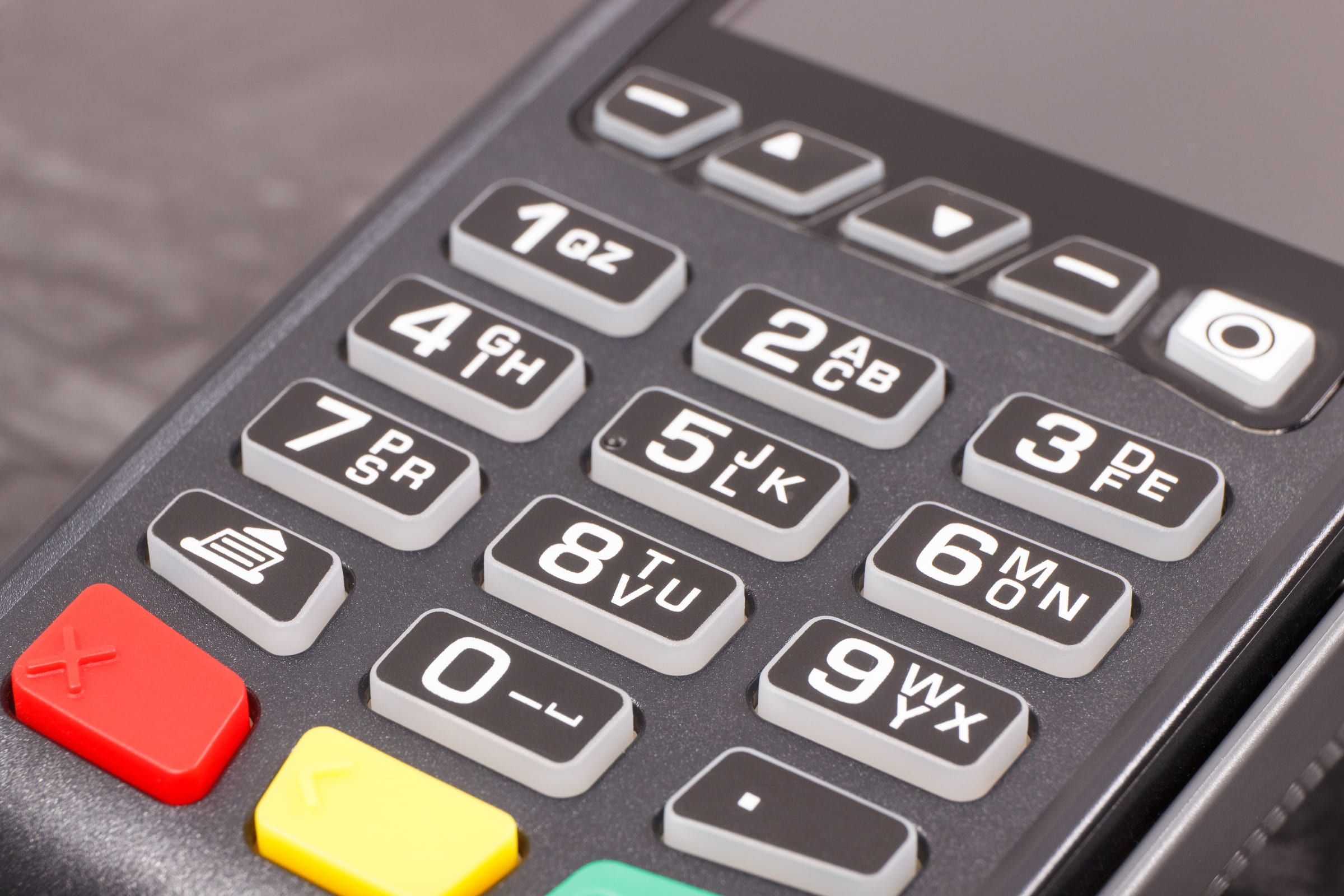 Close crop of the keypad on a point-of-sale card reader.